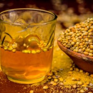 Close up of water of Coriandrum sativum,Coriander with its powder.